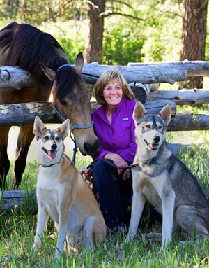 Veryl Goodnight with two of her dogs